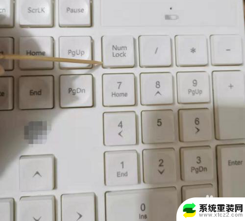 电脑键盘上的小键盘数字打不出来 数字小键盘变成上下左右键怎么还原